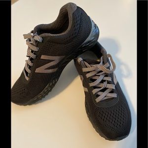 New balance black and silver shoes